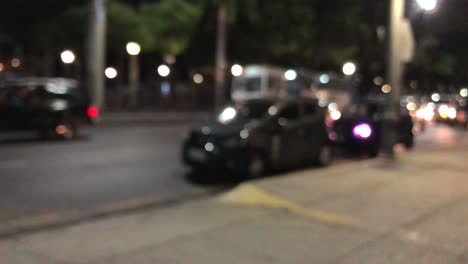 blurred scene of cars passing by in a low traffic street in guayaquil, ecuador