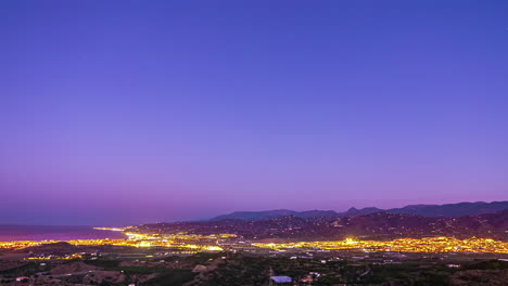 Timelapse-De-La-Vida-Nocturna-En-Málaga,-Amanecer-En-Tono-Púrpura-En-El-Mar-De-Alborán,-España