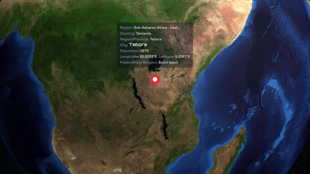 Digital globe rotates and zooms from space into Tabora Tanzania with location data overlay