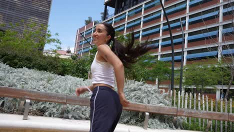 woman dancing in an urban park