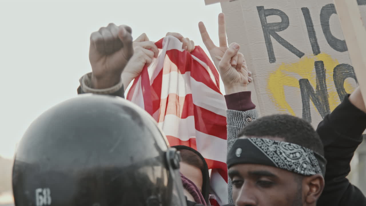 Protest with American Flag and Riot Police