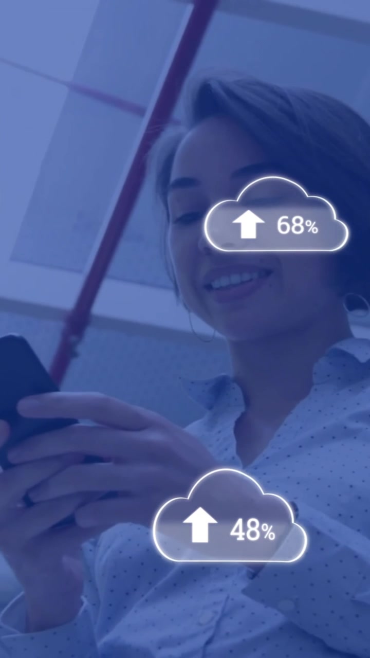 Animation of cloud icons with growing number over businesswoman using smartphone
