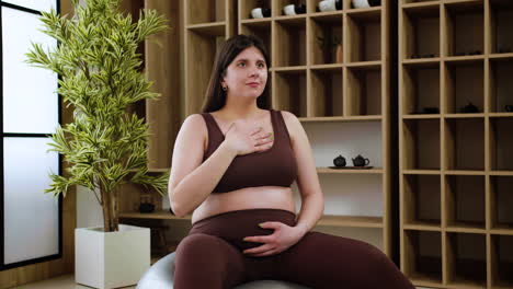 woman doing yoga indoors