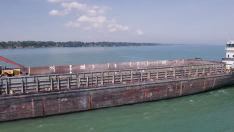 Large-Bulker-Sailing-Across-The-Water-In-Kingsville-Harbour,-Ontario,-Canada-On-A-Sunny-Day