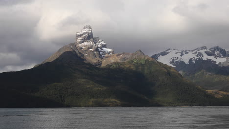 heavy clouds cover the darwin range in the patagonian fjords, tierra del fuego, chile, south america