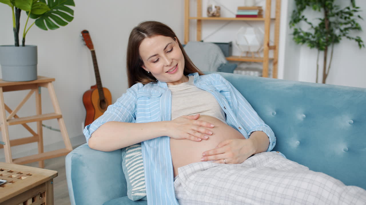 Pregnant Woman Relaxing at Home