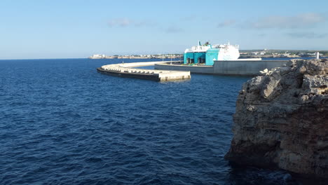 big ferryboat of the company balearia on standby in the harbour of ciutadella on the menorca island in spain