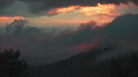 incredible orange sunrise in montserrat mountain range in spain