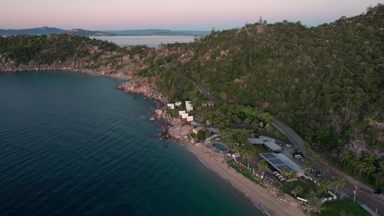 drone shot around Nomads Backpacker hostel on Magnetic Island at sunrise during the golden hour