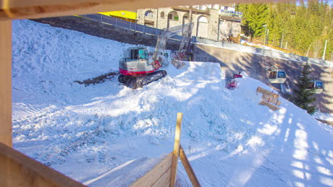 Building-a-ski-and-snowboard-ramp-at-Bad-Gastein,-Austria---time-lapse