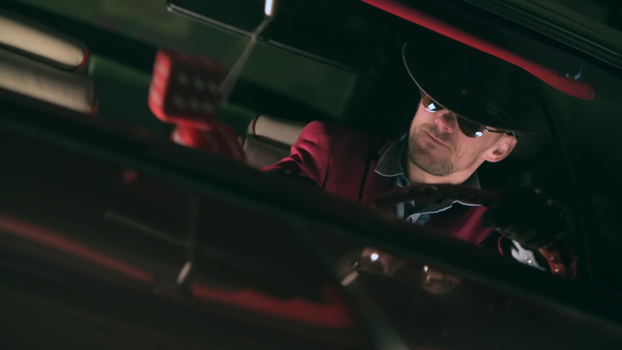 Western Wear Caucasian Men in the Classic Car Listening the Music