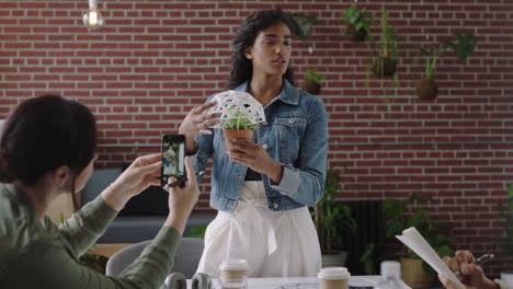 hispanic business woman presenting geodesic dome model in office meeting engineers brainstorming creative design solution discussing ideas in startup workplace presentation