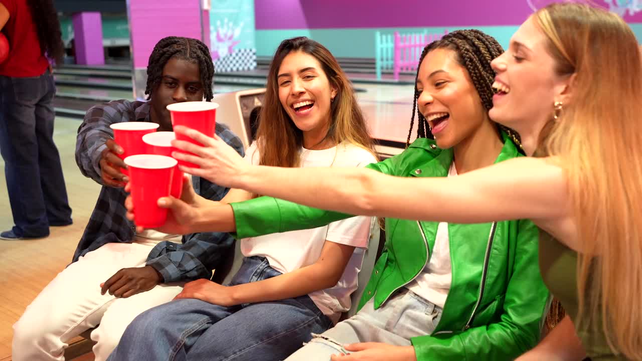 Friends Celebrating at a Bowling Alley