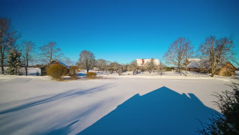 Timelapse-of-remote-winter-cabins-surrounded-by-snow