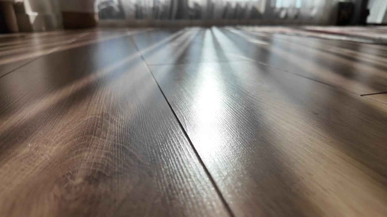 Sunlight Reflections on a Wooden Floor
