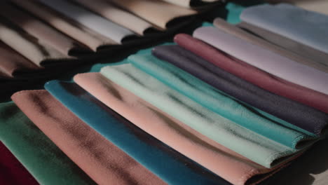 dolly shot: set of fabric samples - a palette for choosing a material for furniture, sewing clothes and other