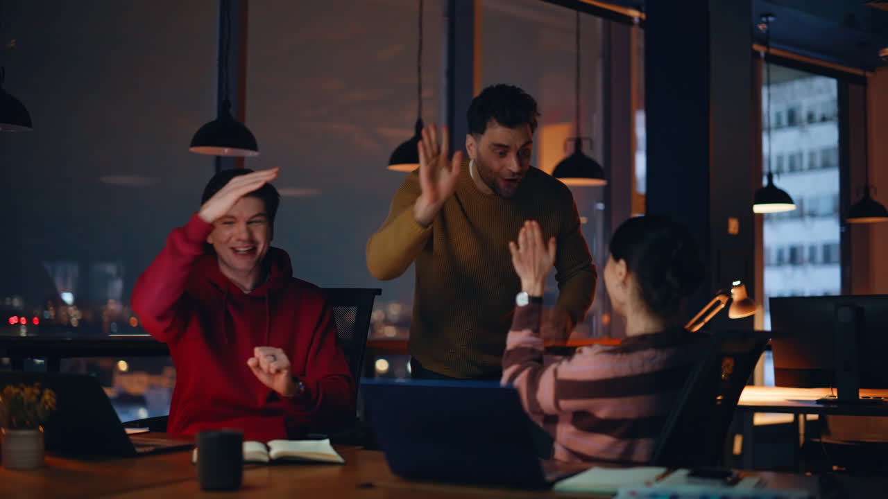 Team celebrates success in the office