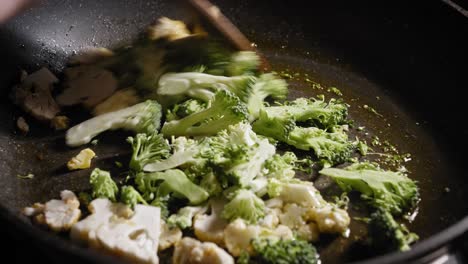 cooking fresh broccoli and cauliflower florets for healthy pasta sauce