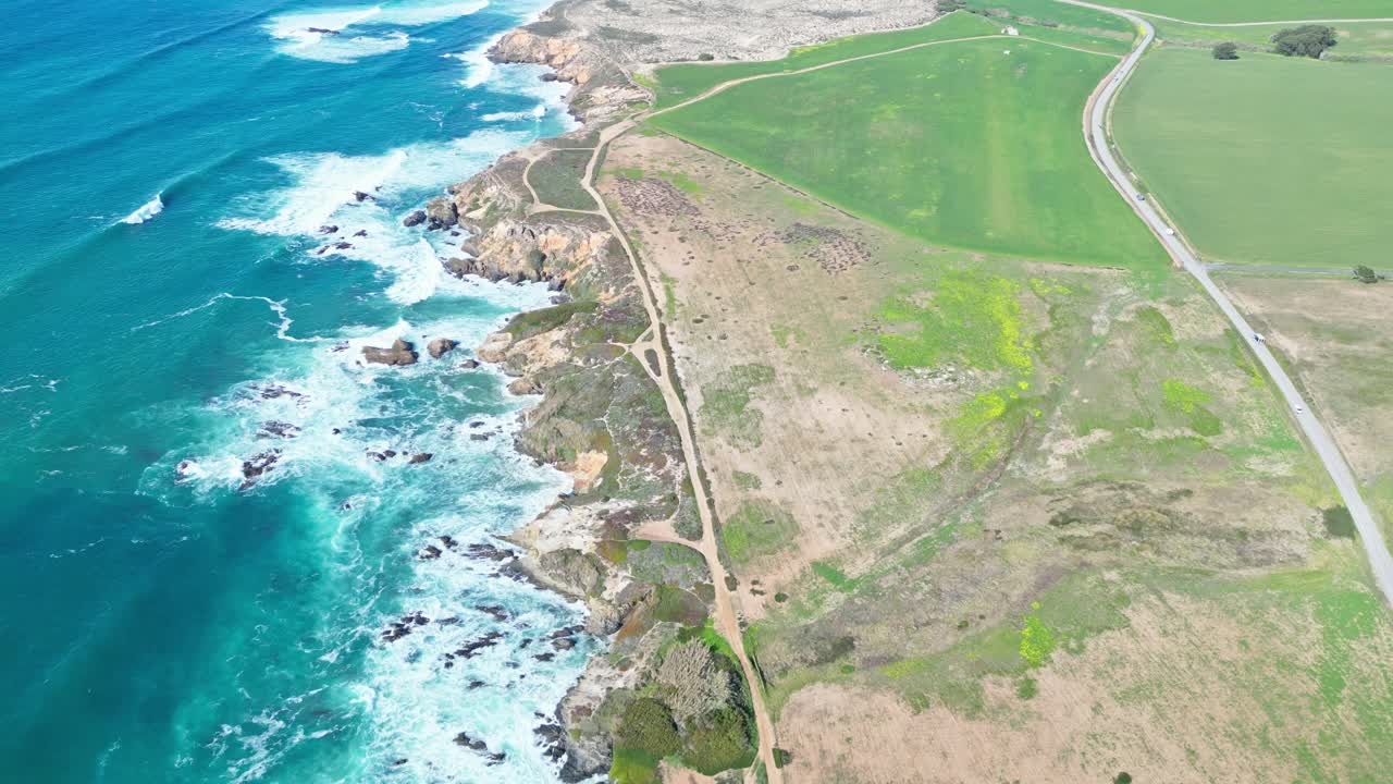 Dramatic coastal cliffs and winding paths by Praia de Samoqueira, Porto Covo