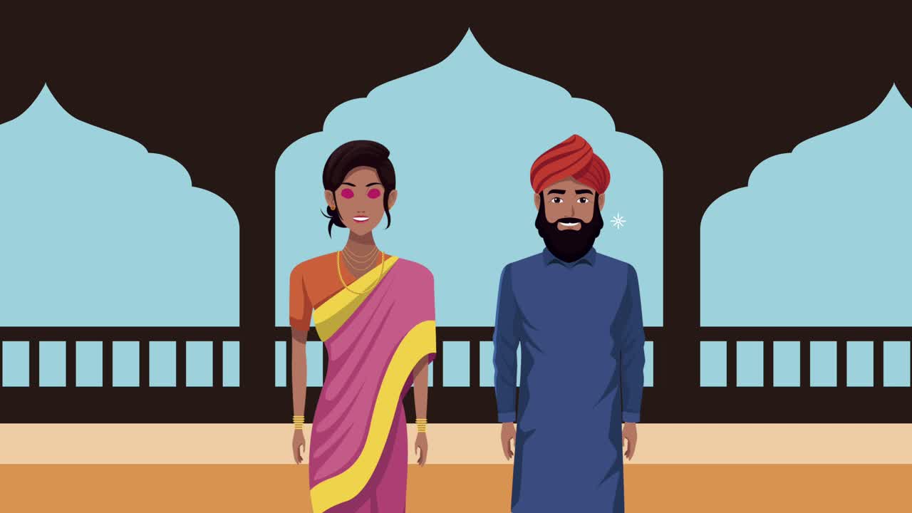 una pareja india en trajes tradicionales.