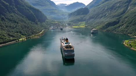cruise ship sailing through a fjord in norway