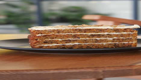 delicious slice of carrot cake with walnuts