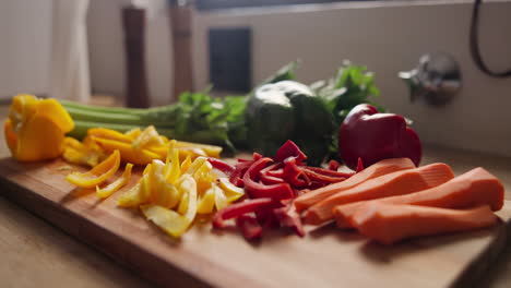 chopped vegetables on a wooden cutting board