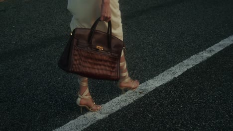 woman walking on runway