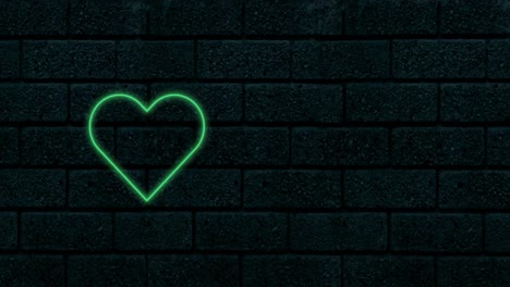 animación de un corazón de neón verde que parpadea sobre un fondo negro