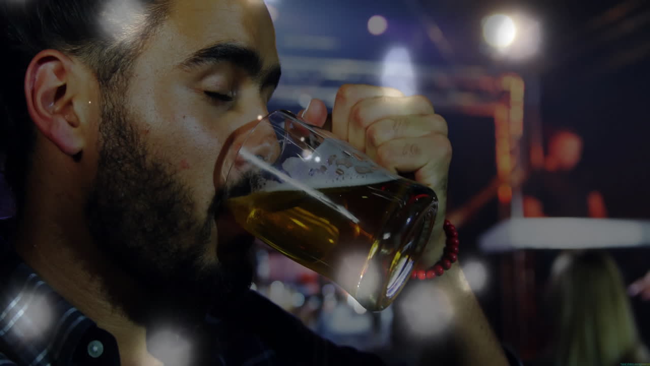 Bearded patron taking beer sip in hospitality industry, with floating foam icon and bokeh lights