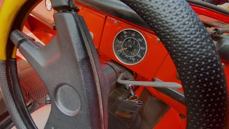 Close-up-shot-of-steering-wheel-car