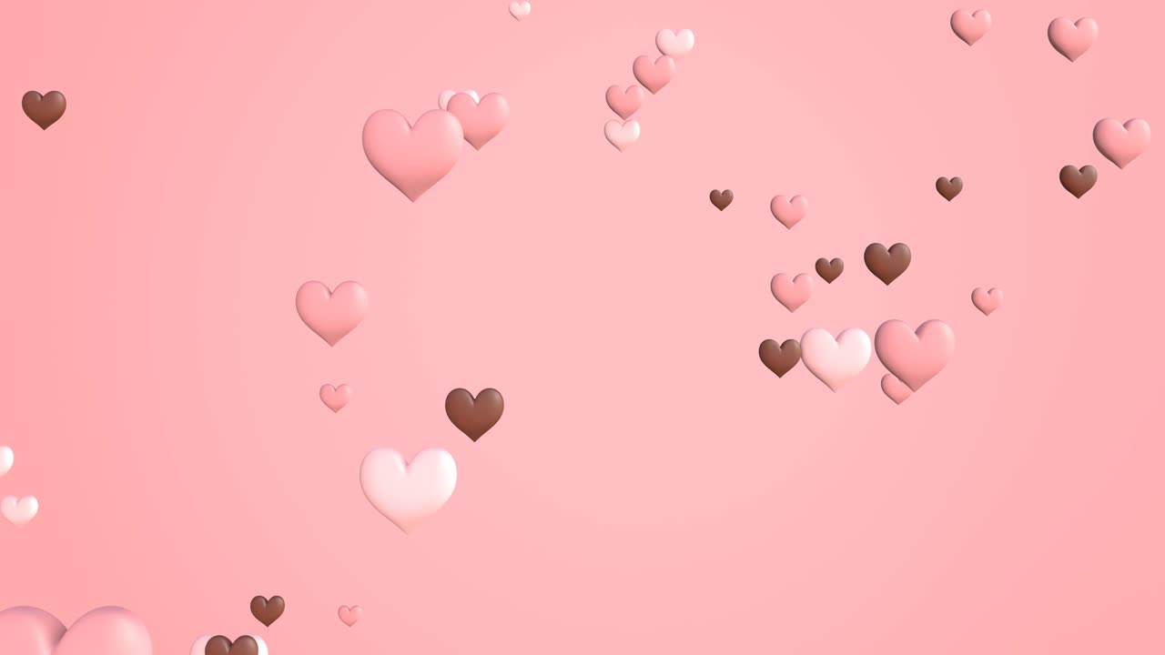 confeti en forma de corazón, sobre un fondo rosado.
