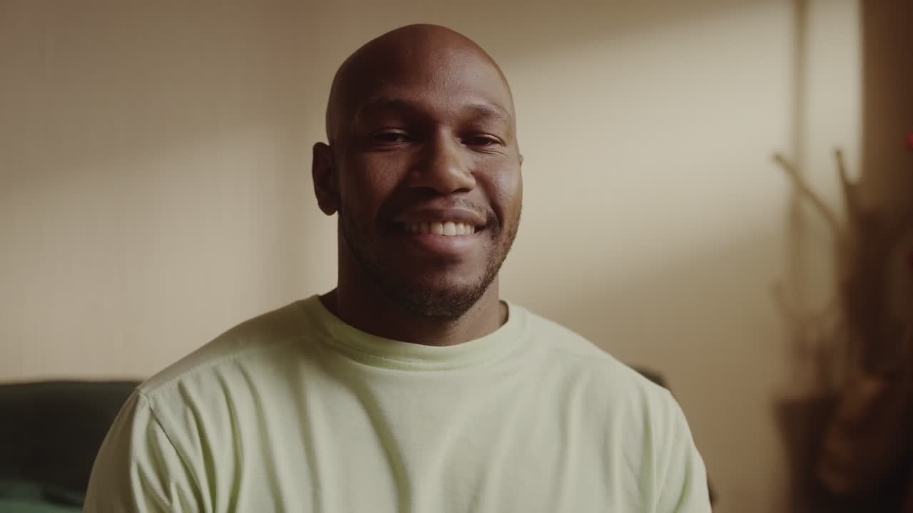 A happy African American man smiling