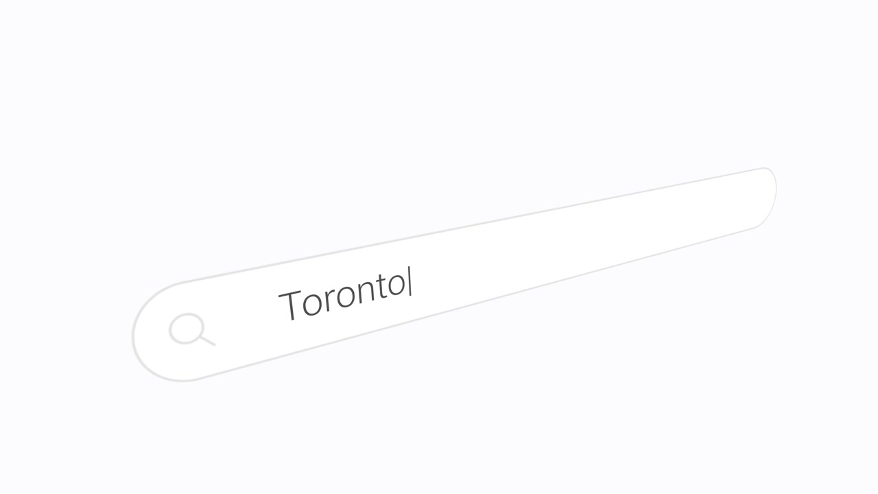 Entering Toronto, Canada In The Search Engine Box. Close-up Shot