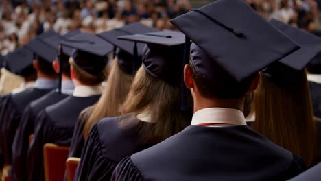 graduates seated at a commencement ceremony