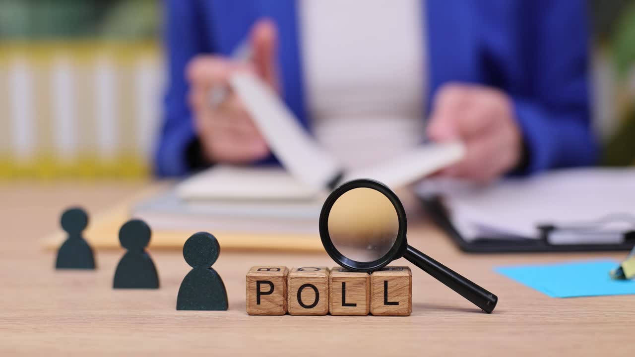 Image of a poll concept with magnifying glass and wooden blocks
