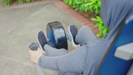 Muslim-Woman's-Legs-Rotate-Pedals-For-Strengthening-Muscles-In-Public-Park