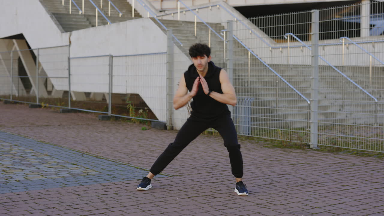 Man Doing Fitness Exercises Outdoors