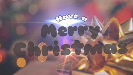 Animation-of-christmas-greetings-text-over-christmas-tree-and-decorations