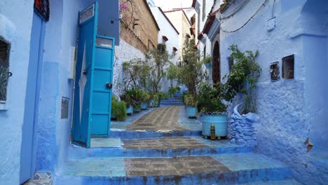 the peaceful blue streets of chefchaouen, morocco, invite travelers to wander through its mesmerizing alleys and colorful doorways