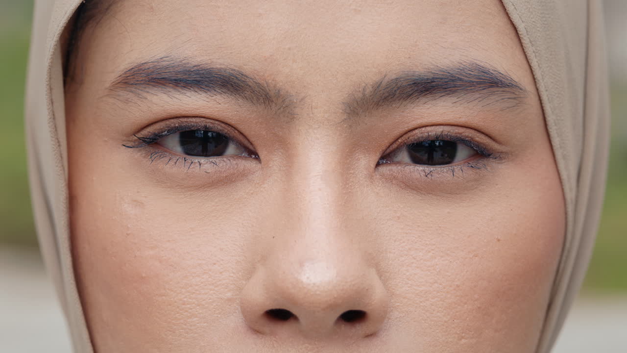 Close-up of a woman's face wearing a hijab