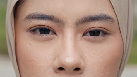 close-up of a woman's face wearing a hijab
