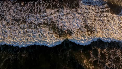 Majestic-ascending-aerial-shot-of-the-Pacific-Ocean-with-waves-in-the-Pacific-Northwest,-Washington-State