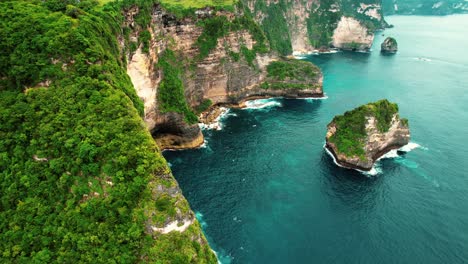 4k drone of massive limestone cliffs at nusa penida, indonesia