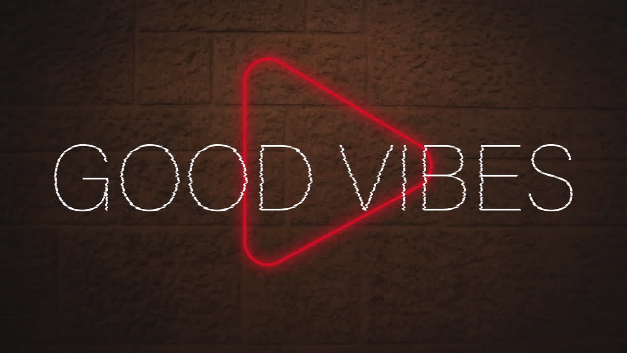 animación digital de buenas vibraciones texto sobre neón rojo icono de juego contra la pared de ladrillo