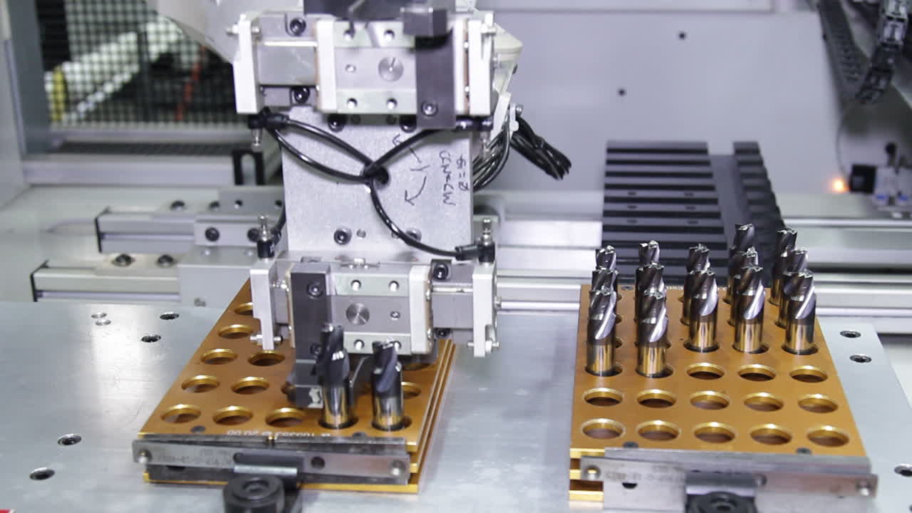 Robotic arm putting tools in slots