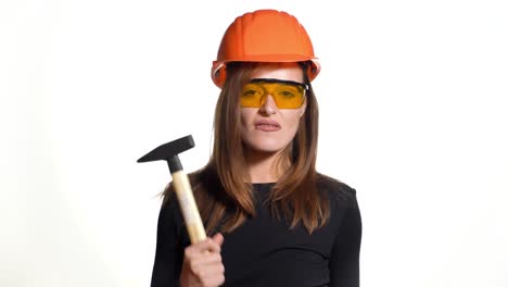 young smiling worker woman. isolated over white background. construction and maintenance.