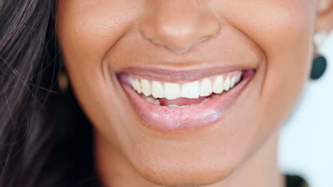 mouth, lips and bright teeth of smiling woman