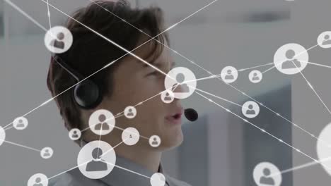 Animation-of-network-of-connections-and-icons-over-businessman-wearing-headset