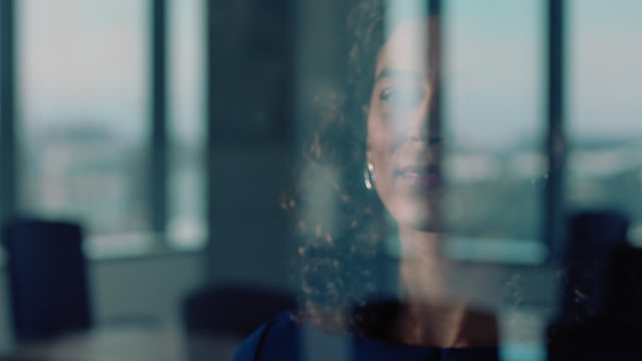 independent business woman looking out window proud ceo planning ahead thinking of ideas for future investment strategy corporate manager enjoying leadership career in office